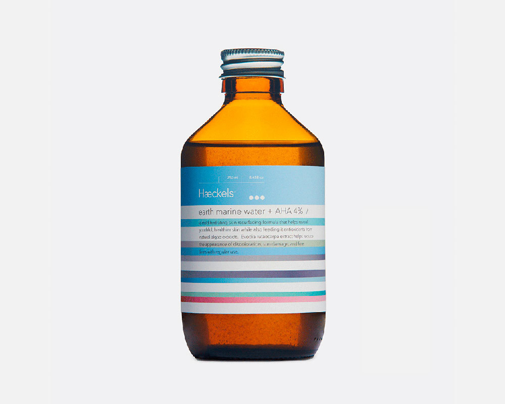 A photo of a dark amber bottle with colourful label, how to take product photos